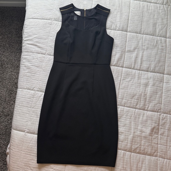 Donna Morgan Dresses & Skirts - Donna Morgan black dress with gold zipper details - size 2